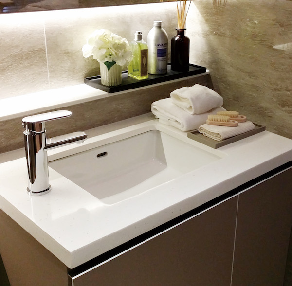 Oslo White by Hanex Solid Surfaces on bathroom sink